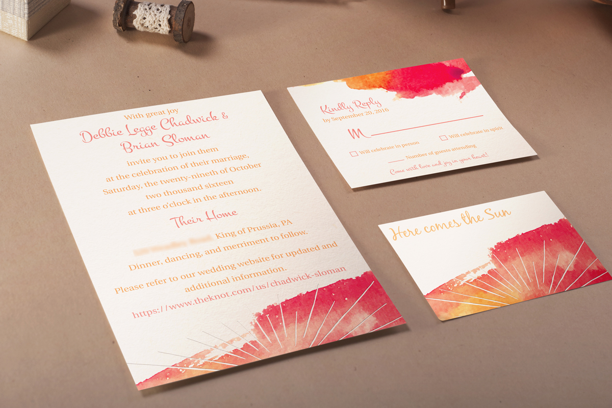 Chadwick & Sloman wedding invitations which feature a sunrise and the words 'Here comes the sun' displayed at an angle.